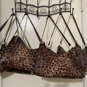 Brand new, small leopard, print boutique style purses.